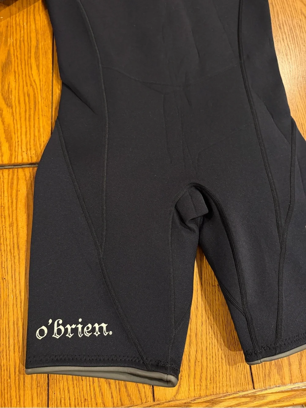 O’Brien Men’s Black/royal blue wetsuit, size large, short sleeve/short style